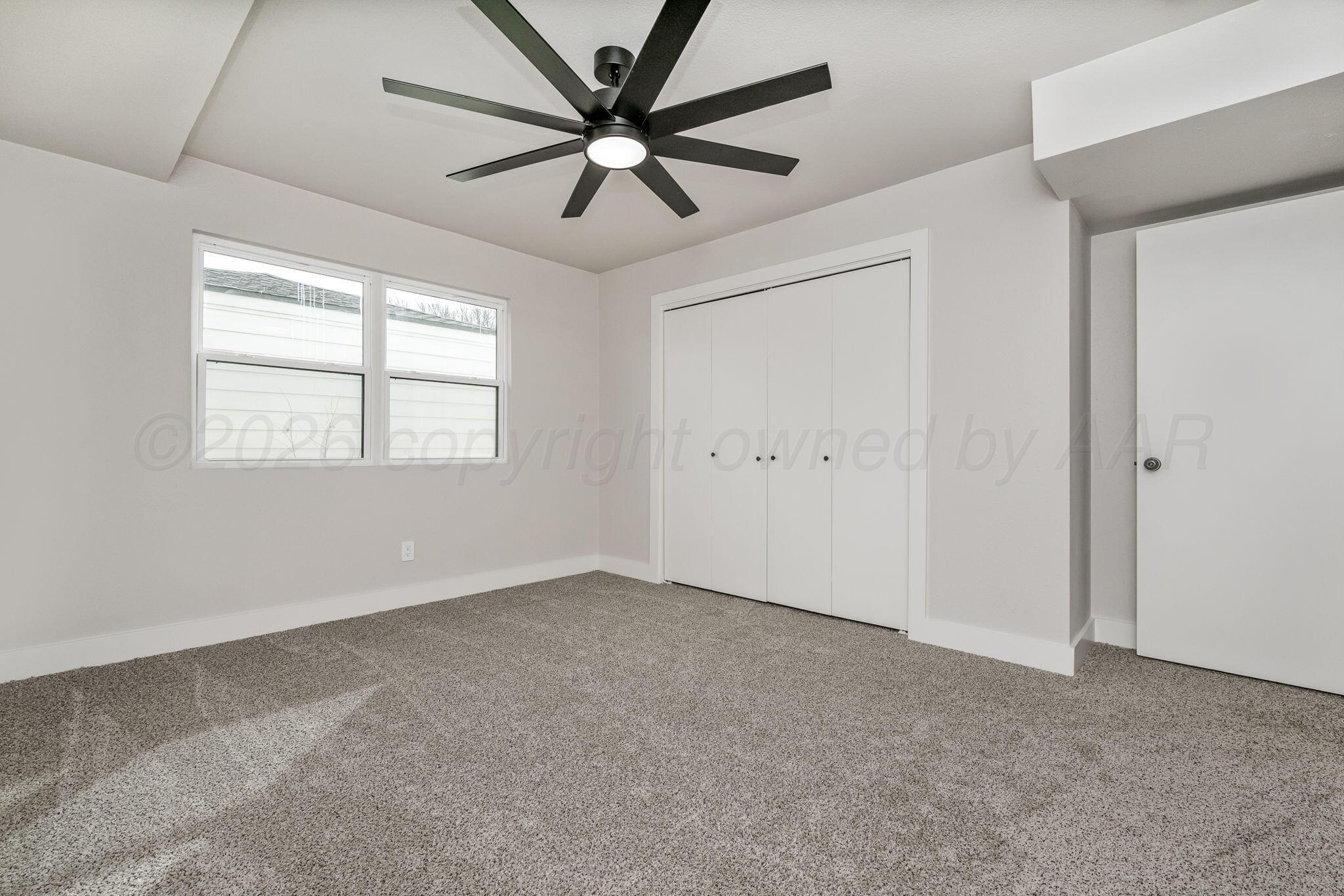 7015 Hurst Street Amarillo, TX 79109 - Photo 12 of 25 Downstairs Bedroom