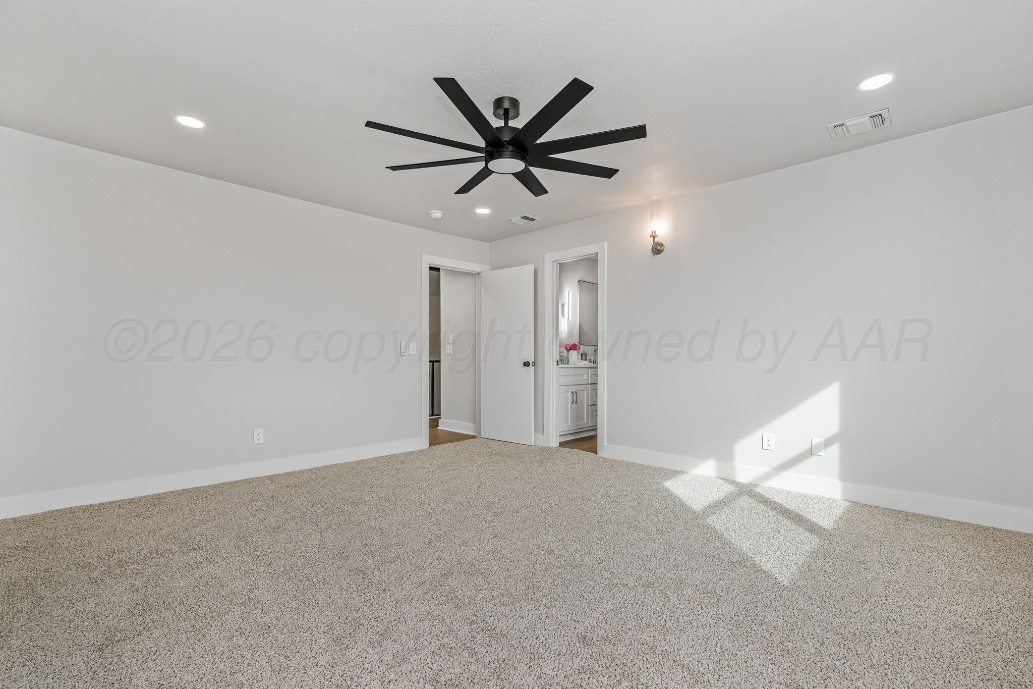 7015 Hurst Street Amarillo, TX 79109 - Photo 14 of 25 Upstairs Master Bedroom