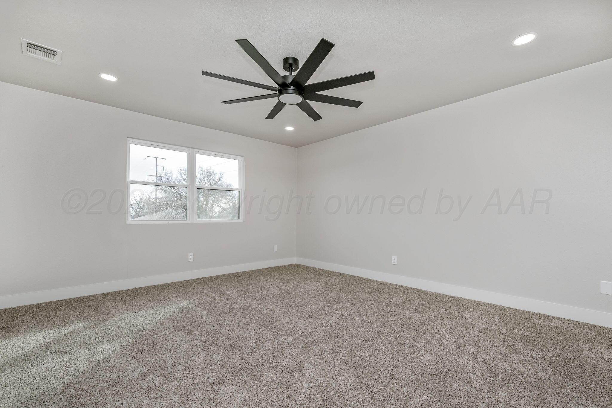 7015 Hurst Street Amarillo, TX 79109 - Photo 15 of 25 Upstairs Master Bedroom 2