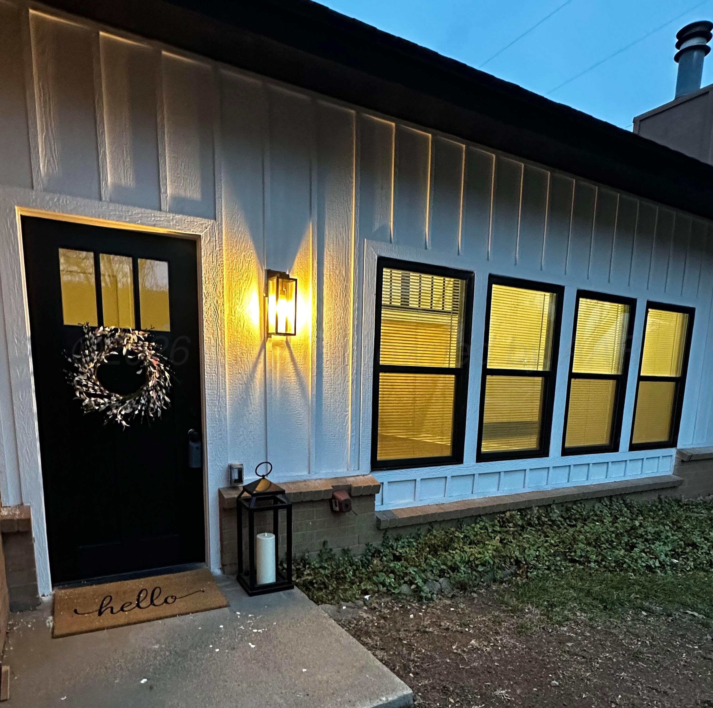 7015 Hurst Street Amarillo, TX 79109 - Photo 23 of 25 Twilight Front 2