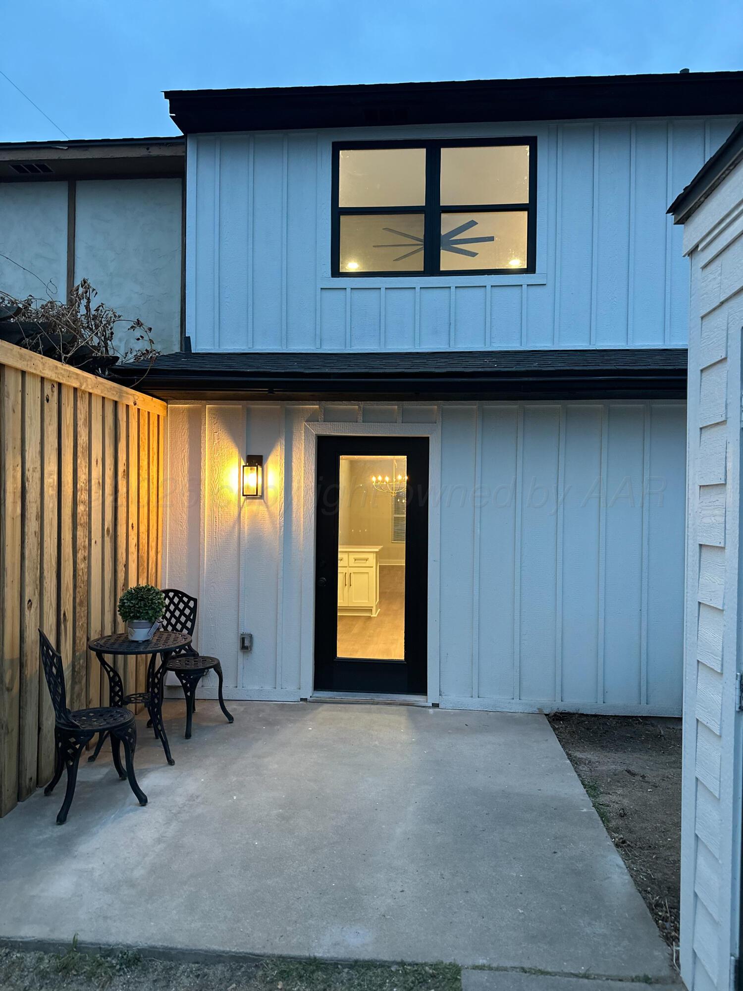 7015 Hurst Street Amarillo, TX 79109 - Photo 24 of 25 Twilight Back Porch