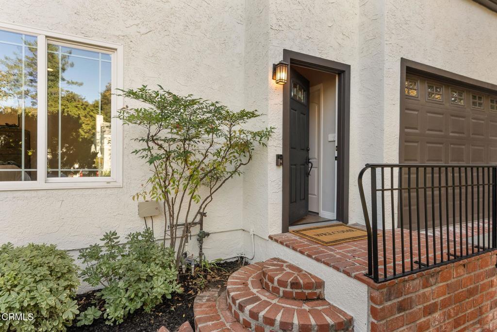 1544 La Loma Road Pasadena, CA 91105 - Photo 3 of 28 a front view of a house with a tree