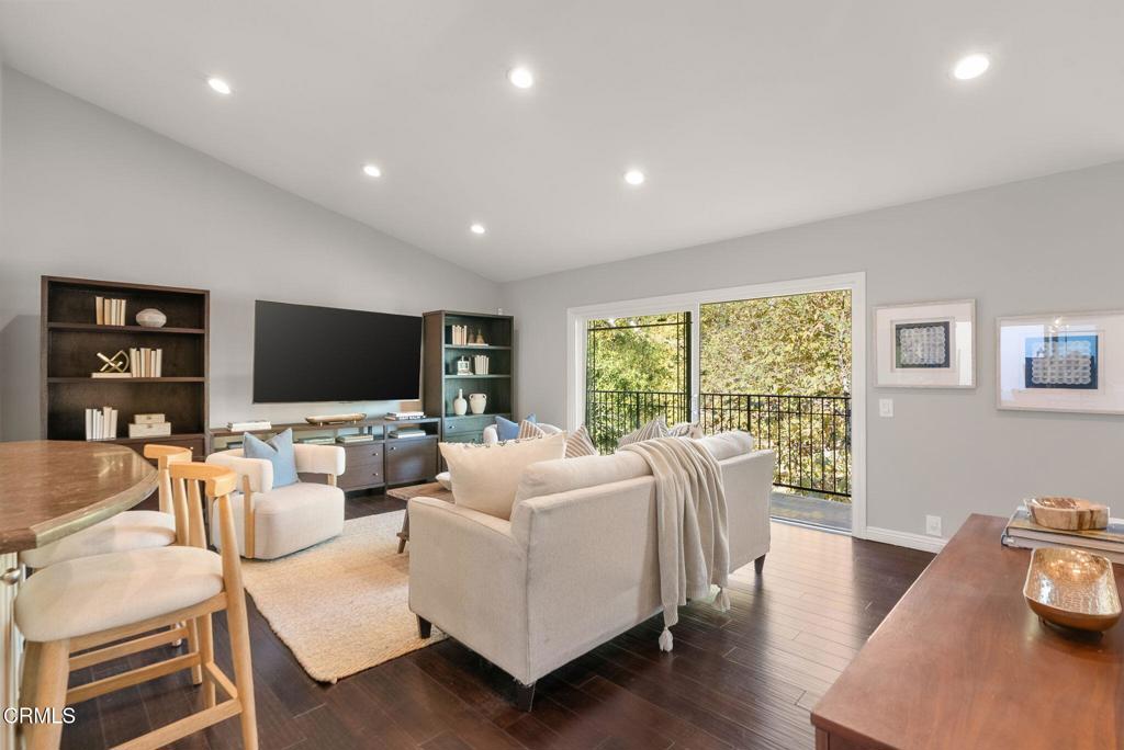 1544 La Loma Road Pasadena, CA 91105 - Photo 7 of 28 a living room with furniture flat screen tv and a large window