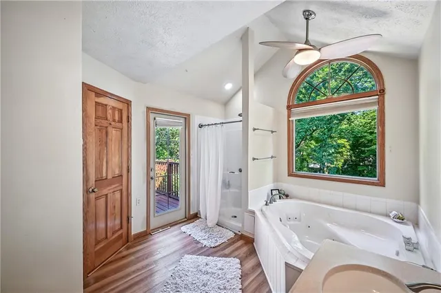 a bedroom with a bed furniture and a window