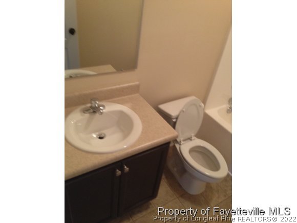 232 Decatur Drive Fayetteville, NC 28303 - Photo 11 of 25 a bathroom with a sink and a toilet