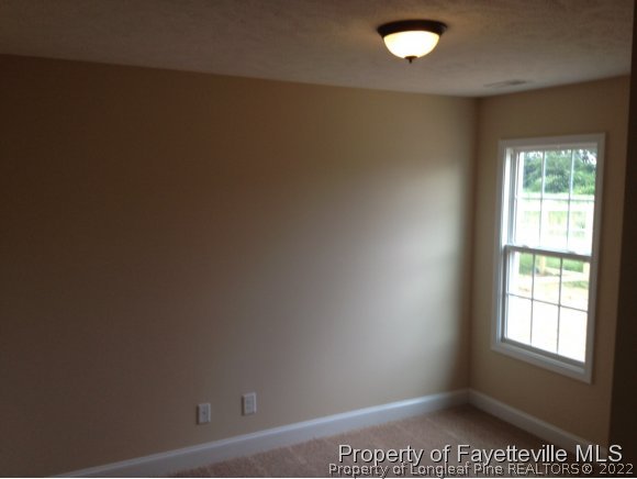 232 Decatur Drive Fayetteville, NC 28303 - Photo 10 of 25 an empty room with a window