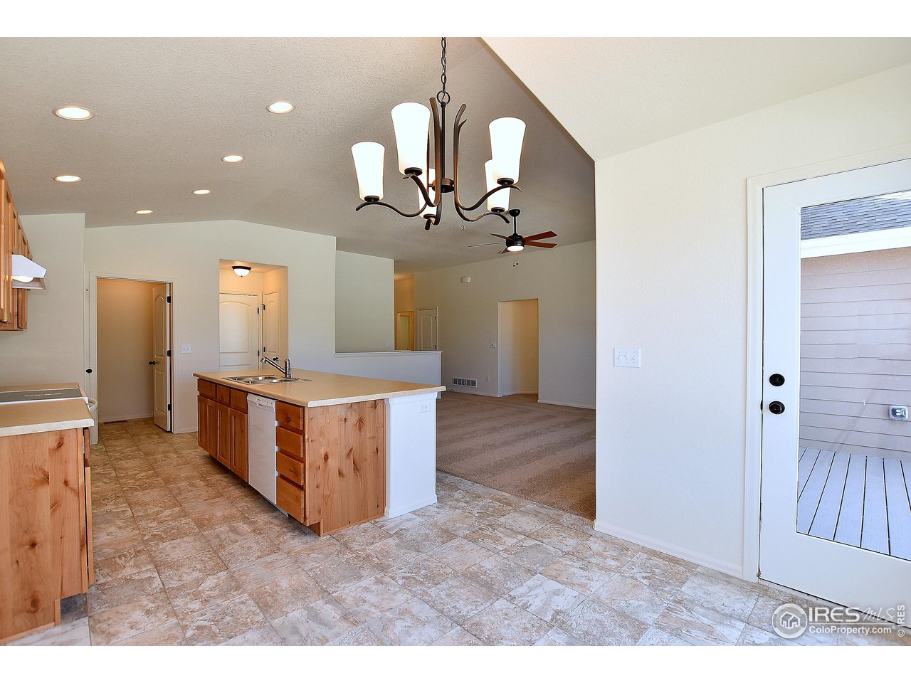 930 Milner Pass Road Severance, CO 80550 - Photo 13 of 37 a view of kitchen and kitchen with a sink