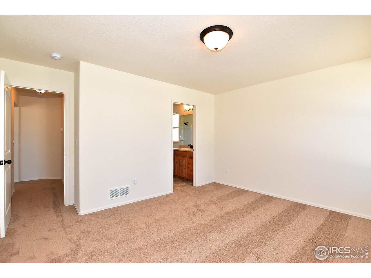930 Milner Pass Road Severance, CO 80550 - Photo 23 of 37 a view of a livingroom with wooden floor