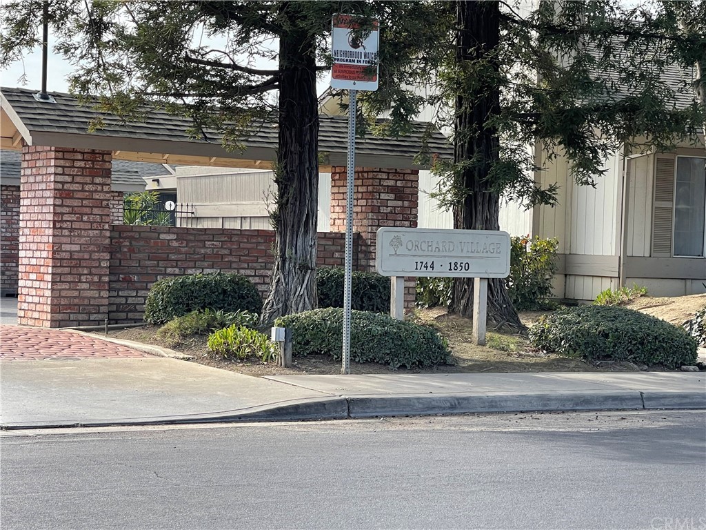 a view of a house with a street
