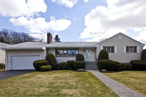 110 Adeline Road Newton, MA 02459 - Photo 1 of 1 a front view of house with yard and trees in the background