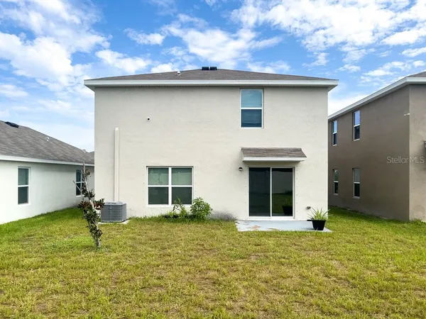 a house view with a garden space
