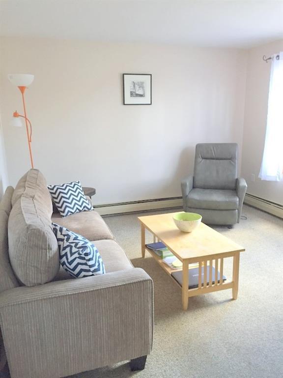 3 Upper Dunbar Road Seal Harbor, ME 04675 - Photo 5 of 8 Living room with windows onto the...