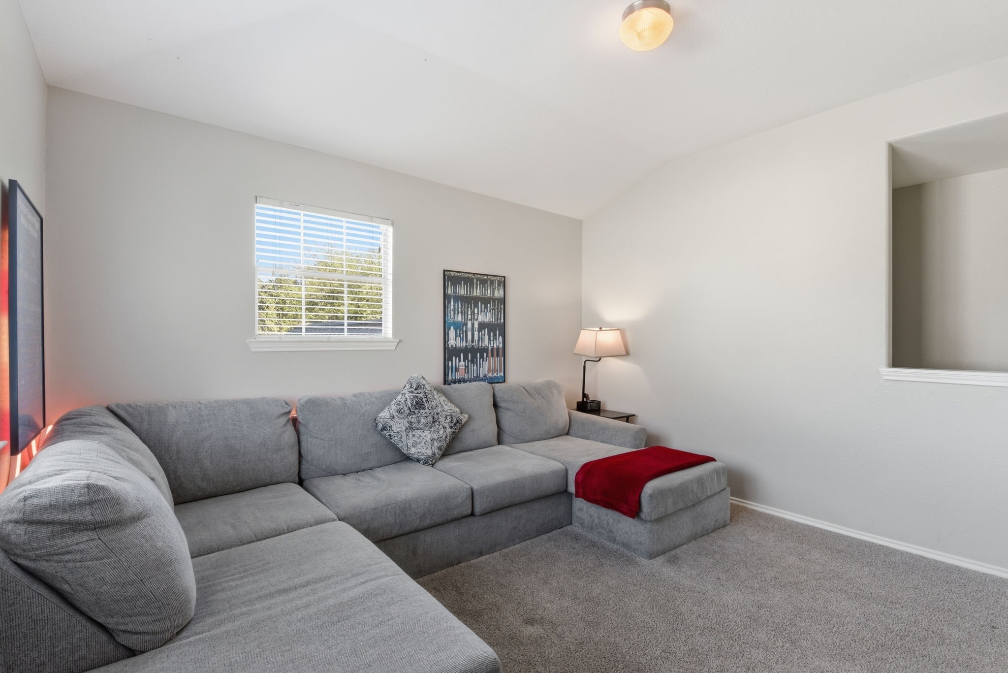 9519 Maple Green Lane Houston, TX 77044 - Photo 29 of 50 a living room with furniture and a window