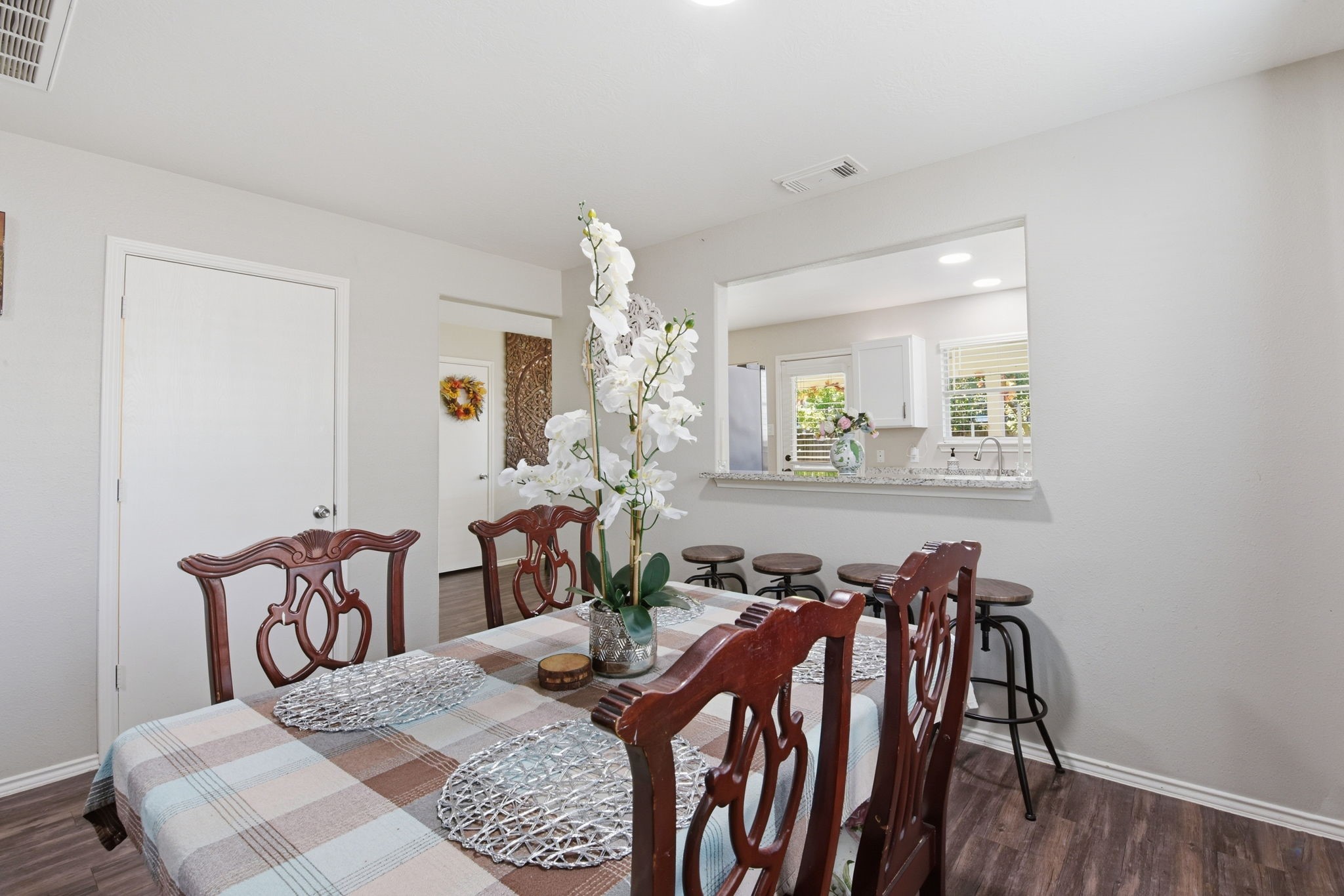 9519 Maple Green Lane Houston, TX 77044 - Photo 36 of 50 a view of a dining room with furniture