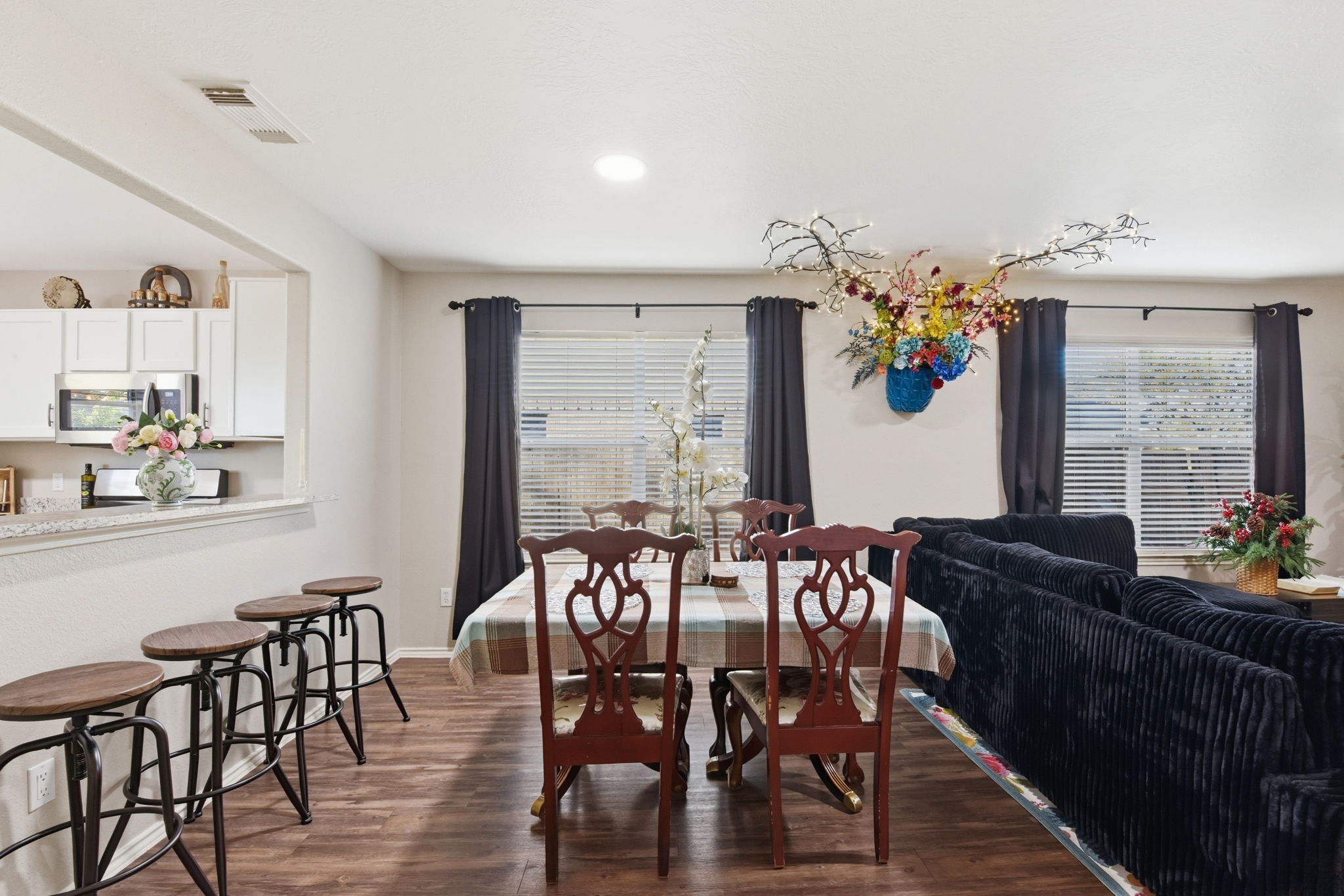 9519 Maple Green Lane Houston, TX 77044 - Photo 39 of 50 a view of a dining room with furniture and chandelier