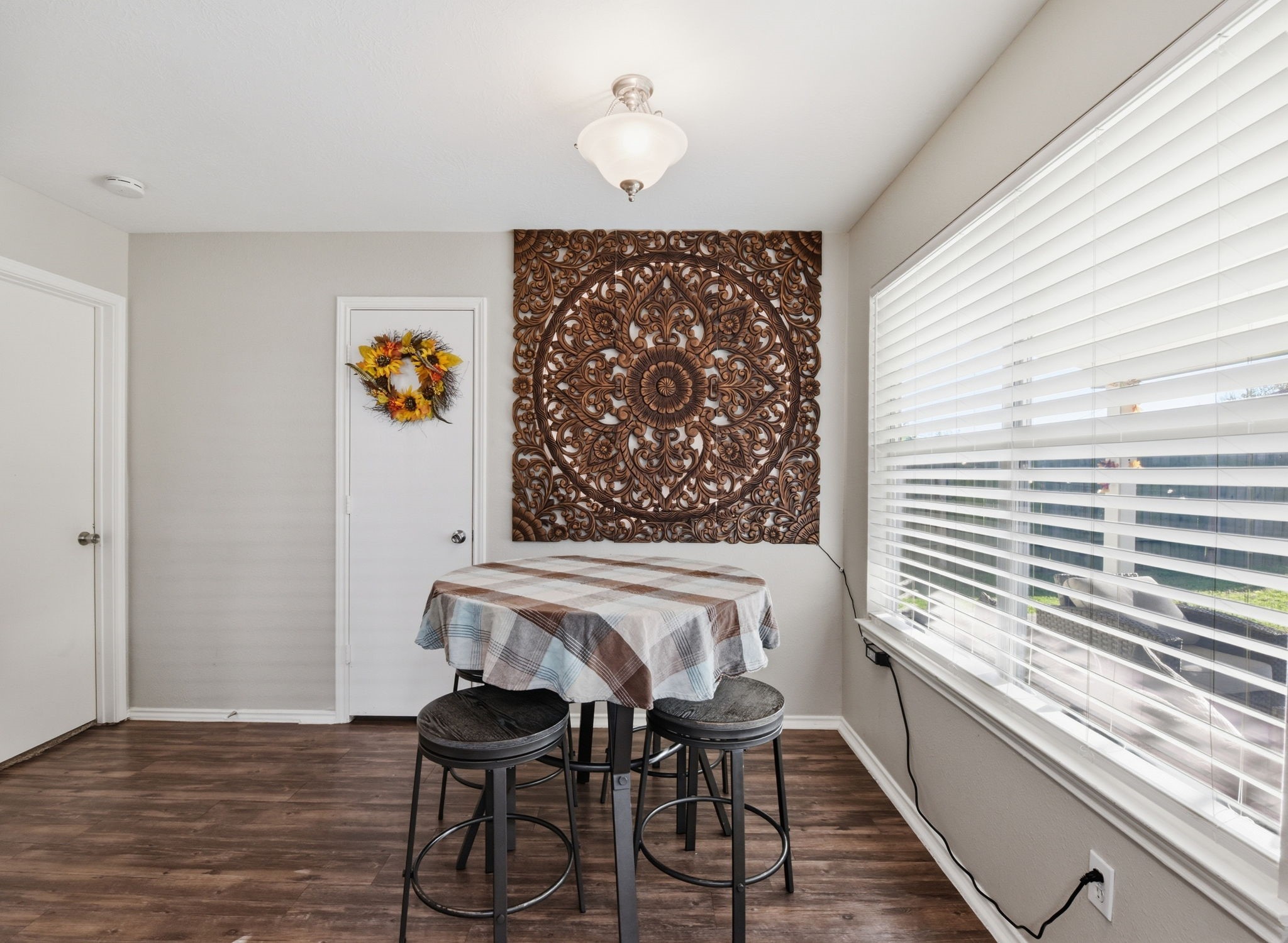 9519 Maple Green Lane Houston, TX 77044 - Photo 48 of 50 a view of a dining room with furniture and wooden floor