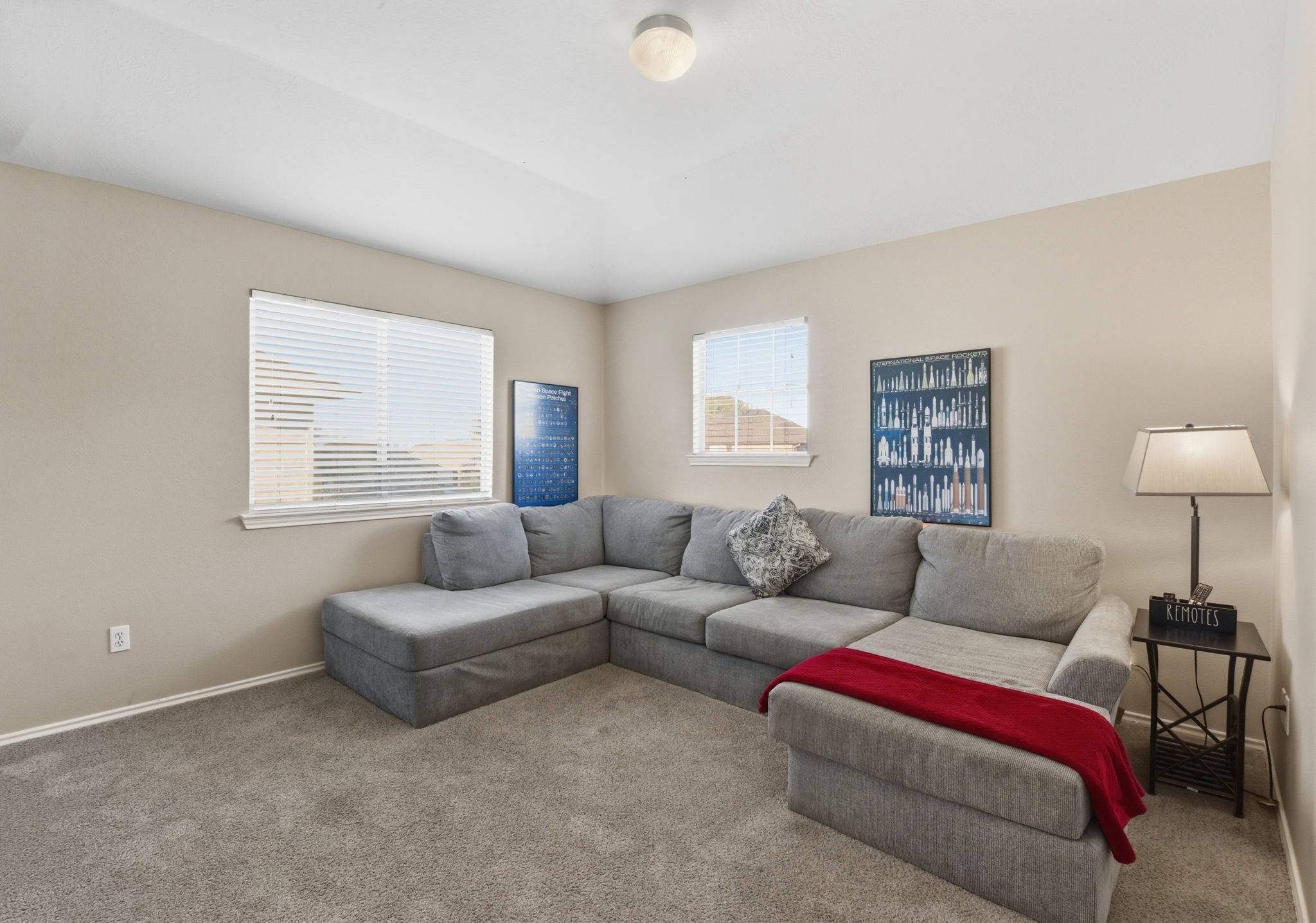 9519 Maple Green Lane Houston, TX 77044 - Photo 49 of 50 a living room with furniture and a large window