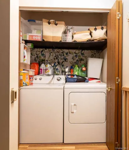 a utility room with washer and dryer