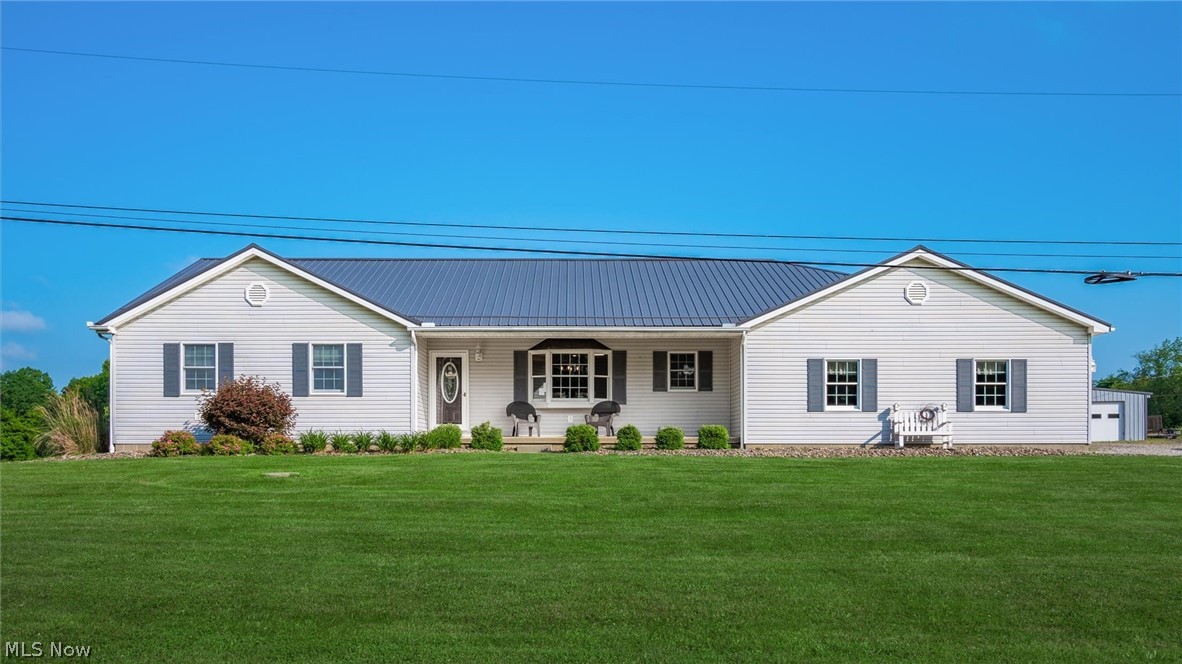 9393 Pioneer Road Byesville, OH 43723 - Photo 1 of 35 Single story home with a front lawn