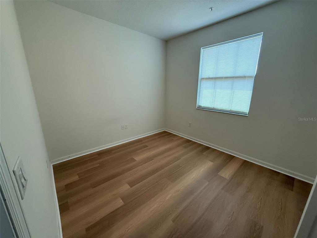 1766 Portofino Meadows Boulevard Orlando, FL 32824 - Photo 12 of 20 an empty room with a window