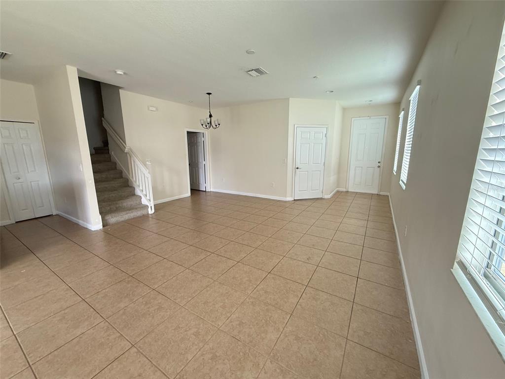 1766 Portofino Meadows Boulevard Orlando, FL 32824 - Photo 4 of 20 a view of an empty room