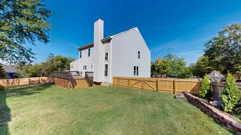 swimming pool view with a outdoor seating area