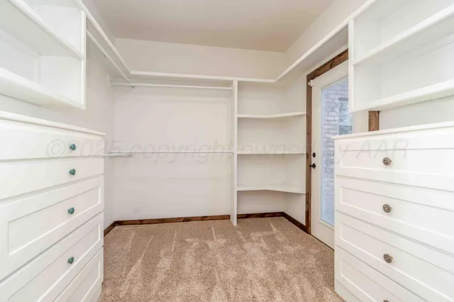 a bathroom with a sink vanity granite and a mirror