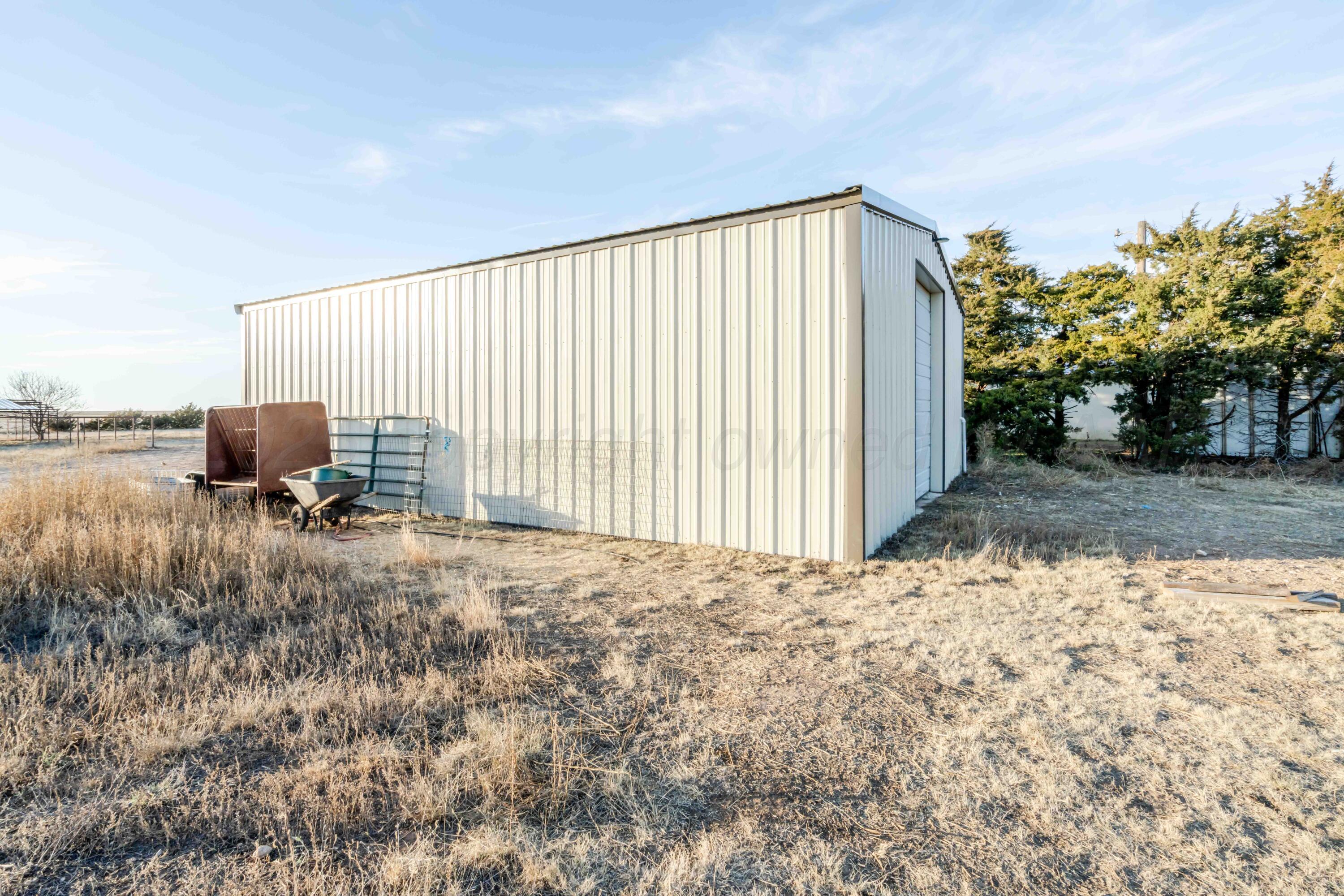 5490 West Rd R Dumas, TX 79029 - Photo 33 of 36 a view of backyard with outdoor space