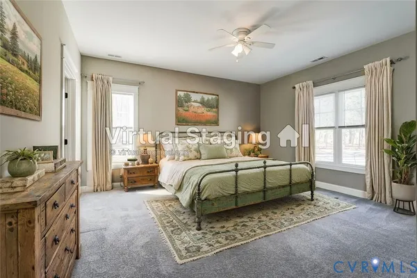 a view of an empty room with a fan