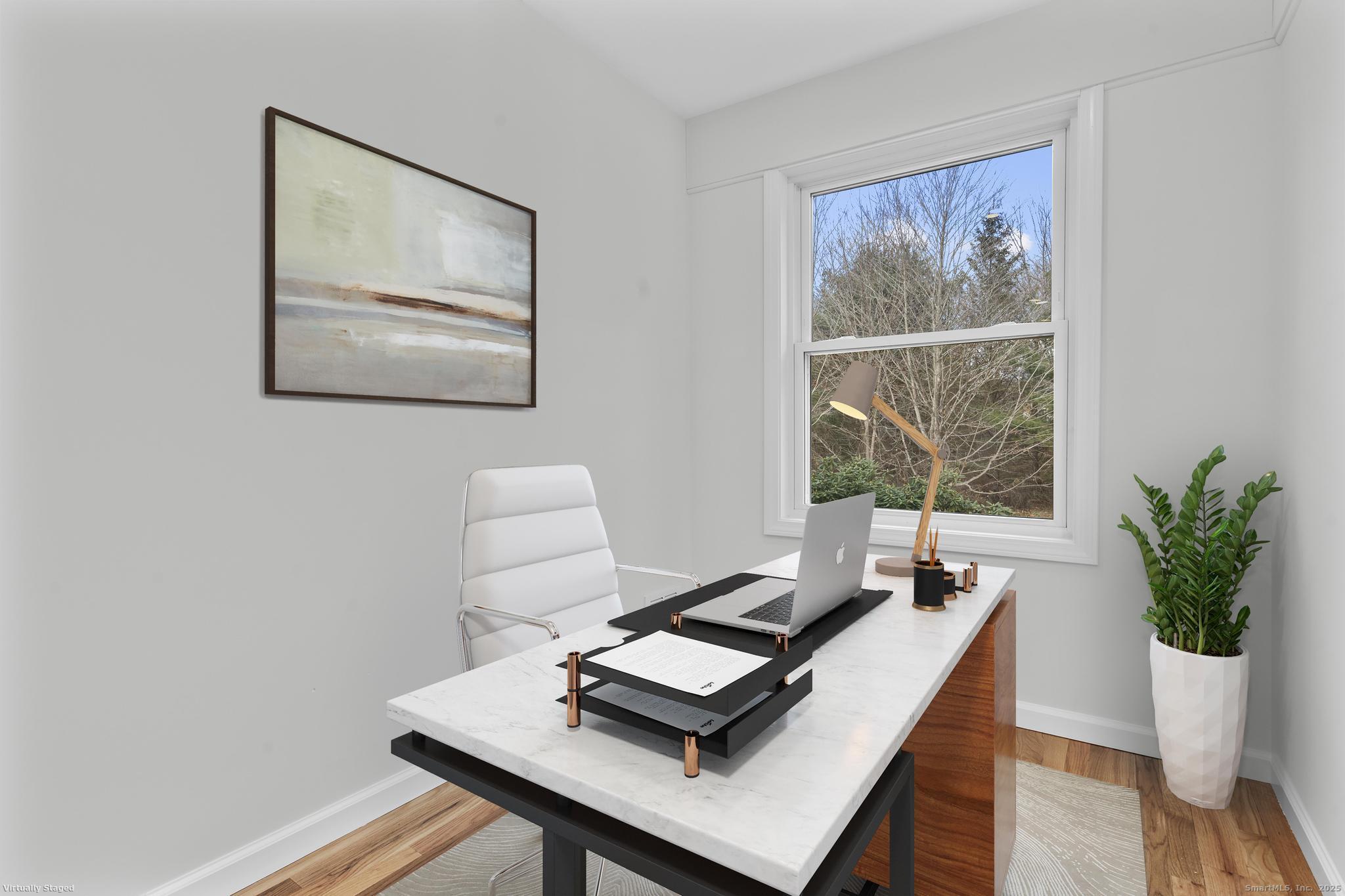 1092 Durham Road Guilford, CT 06437 - Photo 12 of 38 a living room with furniture and a large window