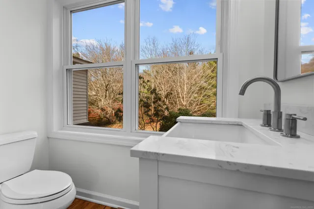 a bathroom with a bathtub and a sink