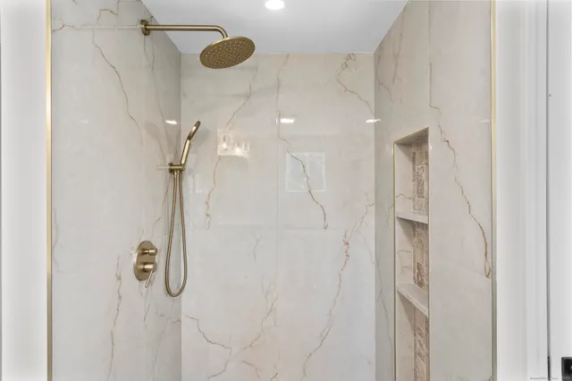 an empty room with a empty space and windows