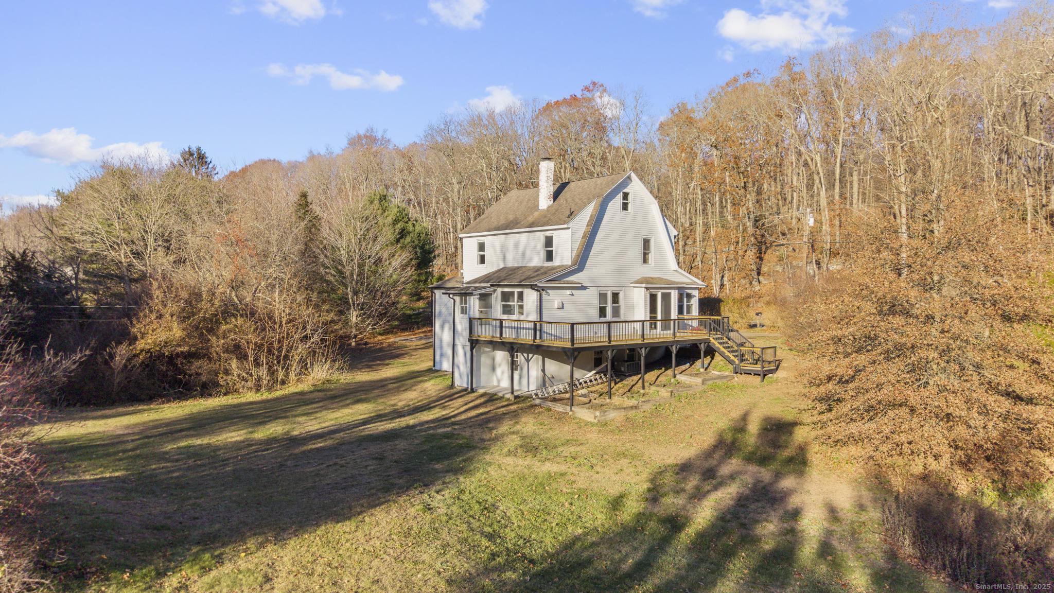 1092 Durham Road Guilford, CT 06437 - Photo 27 of 38 a view of a house with a yard