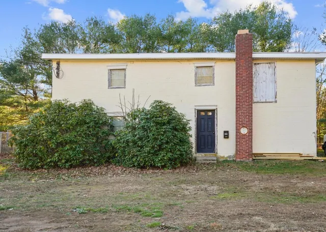a view of a porch with a wooden floor