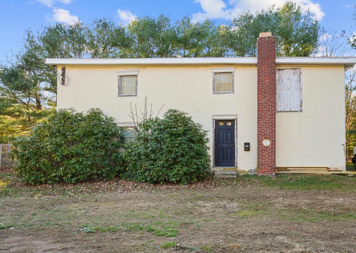 1092 Durham Road Guilford, CT 06437 - Photo 28 of 38 a view of a house with a yard and plants