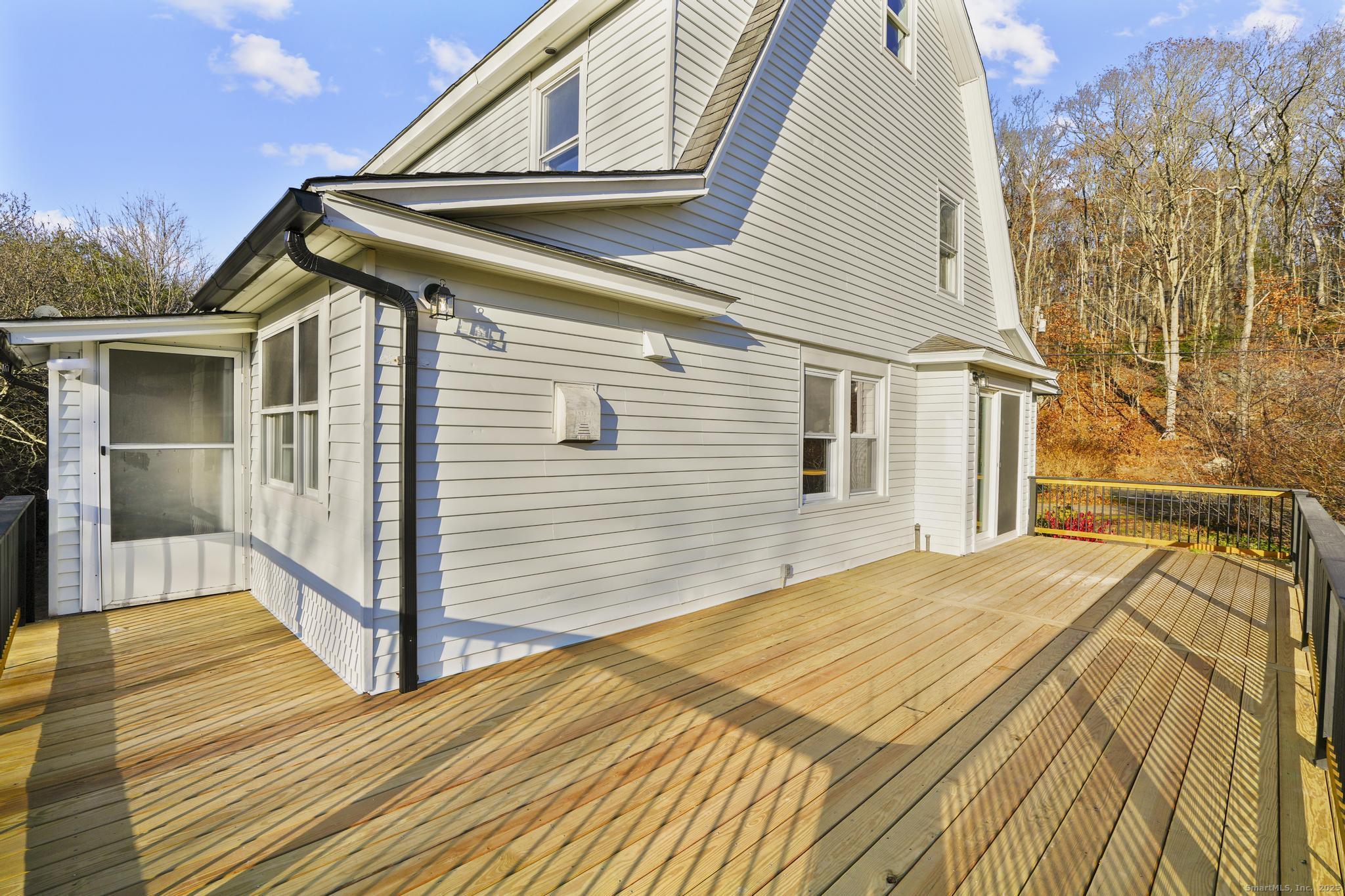 1092 Durham Road Guilford, CT 06437 - Photo 3 of 38 a view of a house with a backyard
