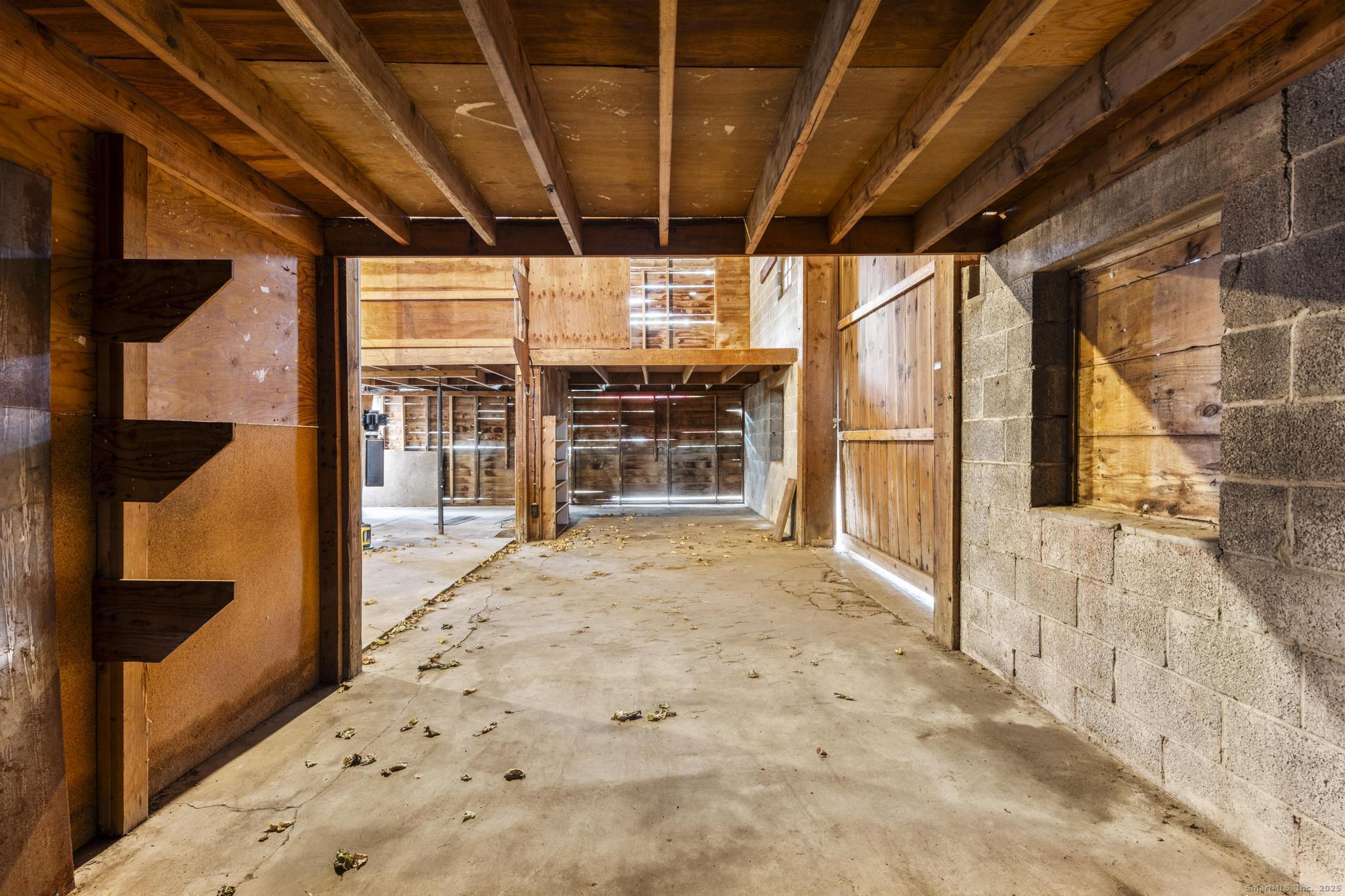 1092 Durham Road Guilford, CT 06437 - Photo 31 of 38 a view of a porch with a wooden floor