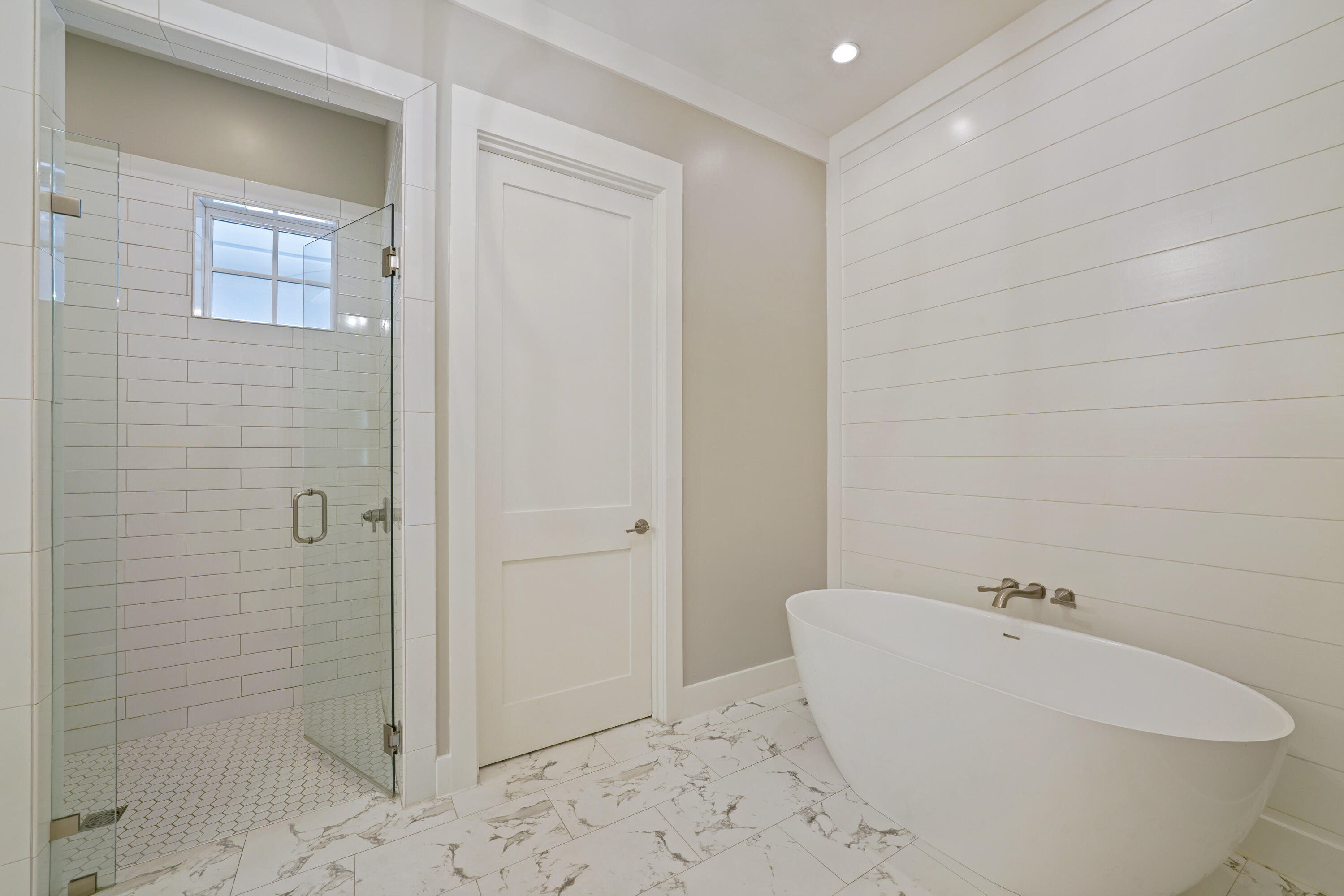 76 Tanglewood Drive Santa Rosa Beach, FL 32459 - Photo 15 of 29 a bathroom with a bathtub and shower