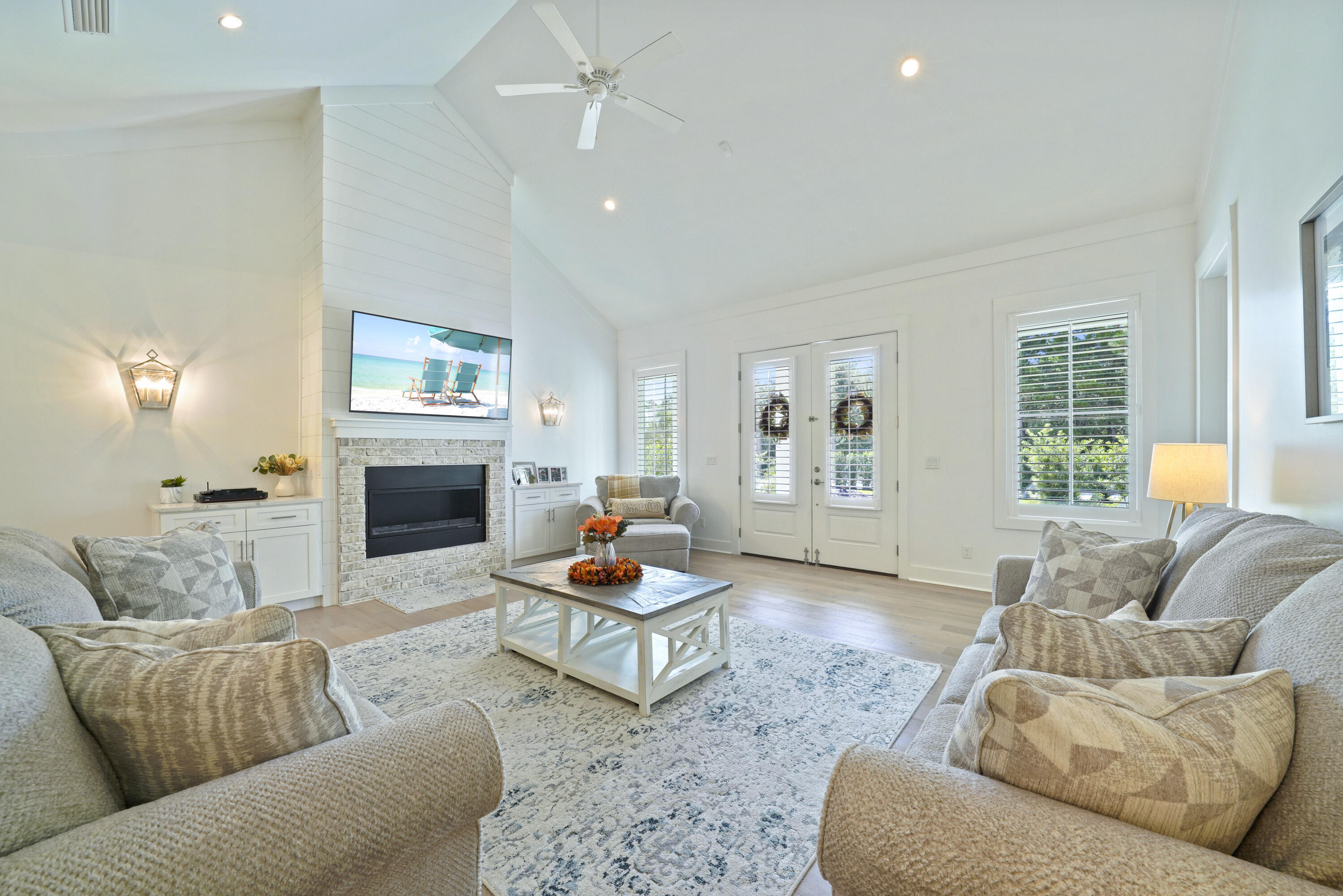 76 Tanglewood Drive Santa Rosa Beach, FL 32459 - Photo 19 of 29 a living room with furniture and a fireplace