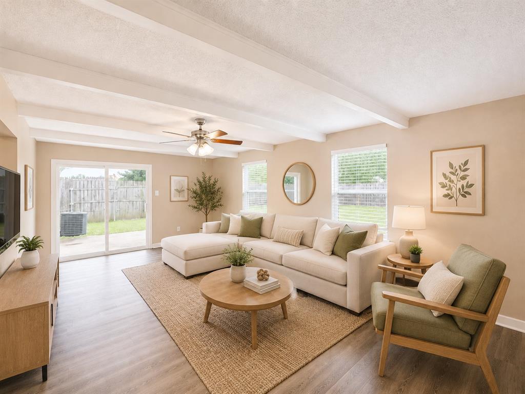 1231 Rutherford Drive Mesquite, TX 75149 - Photo 7 of 29 a living room with furniture and a large window