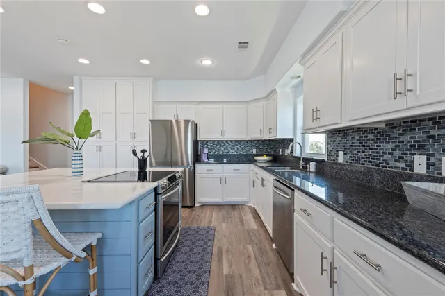 a bathroom with a tub and shower