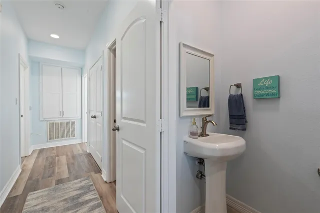 a view of a house with swimming pool and porch