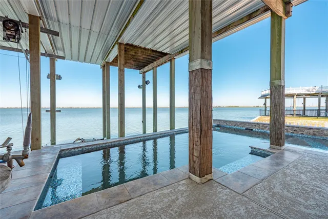 a view of a hardwood floor in a room