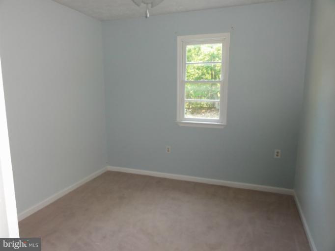 234 Baldwin Road Front Royal, VA 22630 - Photo 7 of 14 an empty room with a window