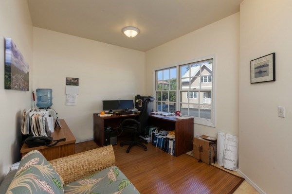 65-1231 Opelo Road, Unit 5 Kamuela, HI 96743 - Photo 4 of 7 a livingroom with workspace and a window