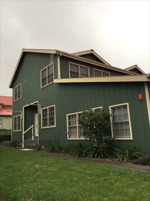 65-1231 Opelo Road, Unit 5 Kamuela, HI 96743 - Photo 5 of 7 a front view of a house with a garden