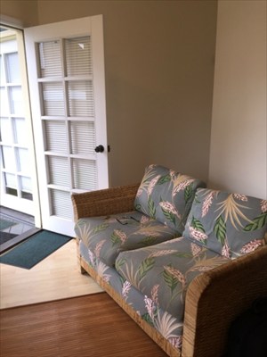 65-1231 Opelo Road, Unit 5 Kamuela, HI 96743 - Photo 6 of 7 a bed sitting in a bedroom next to a window