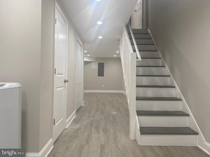 224 North Rose Street Baltimore, MD 21224 - Photo 10 of 14 a view of entryway and hall with wooden floor