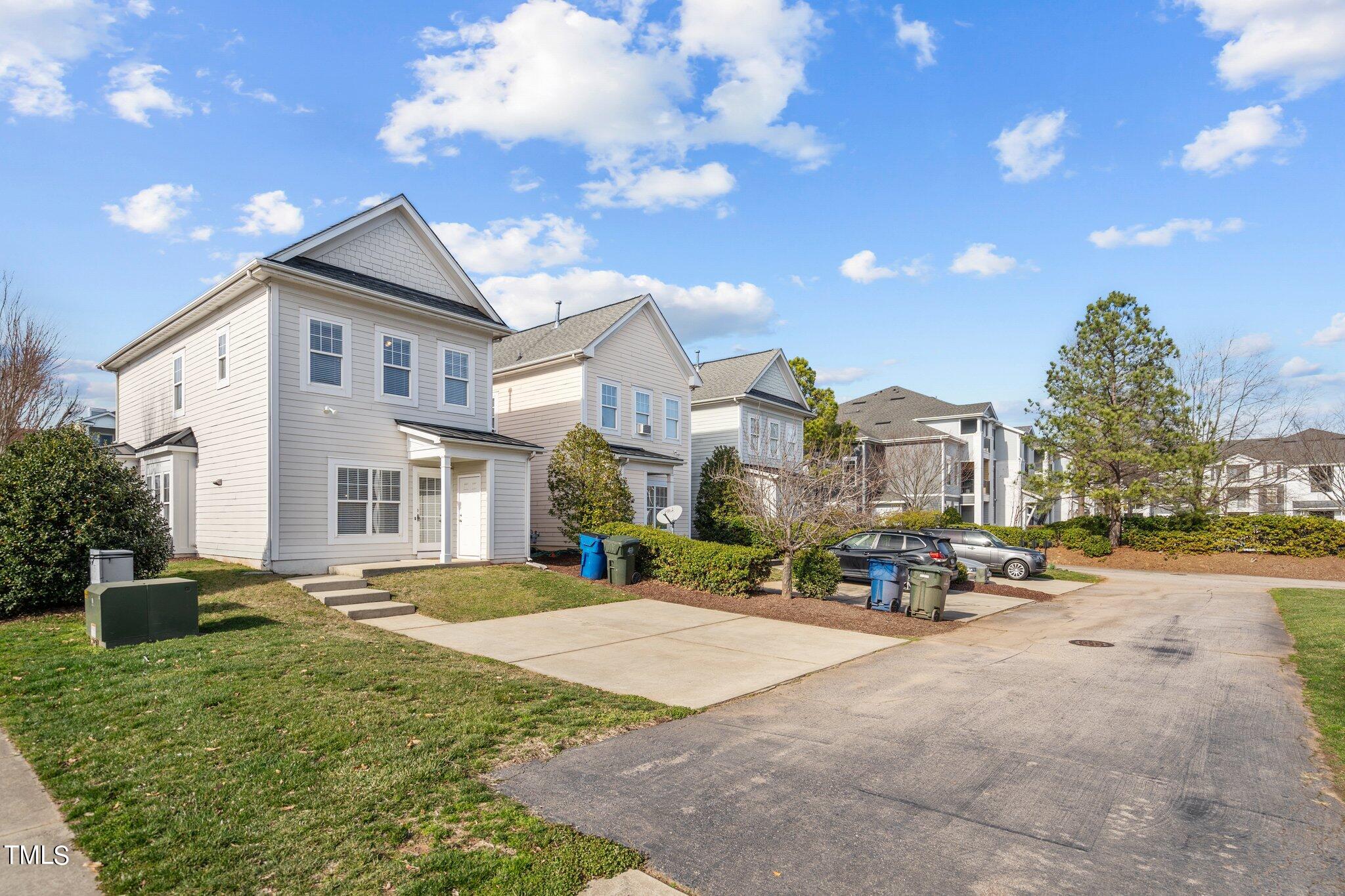 7765 Courtney Estates Drive Raleigh, NC 27617 - Photo 27 of 37 a view of a street in front of a house