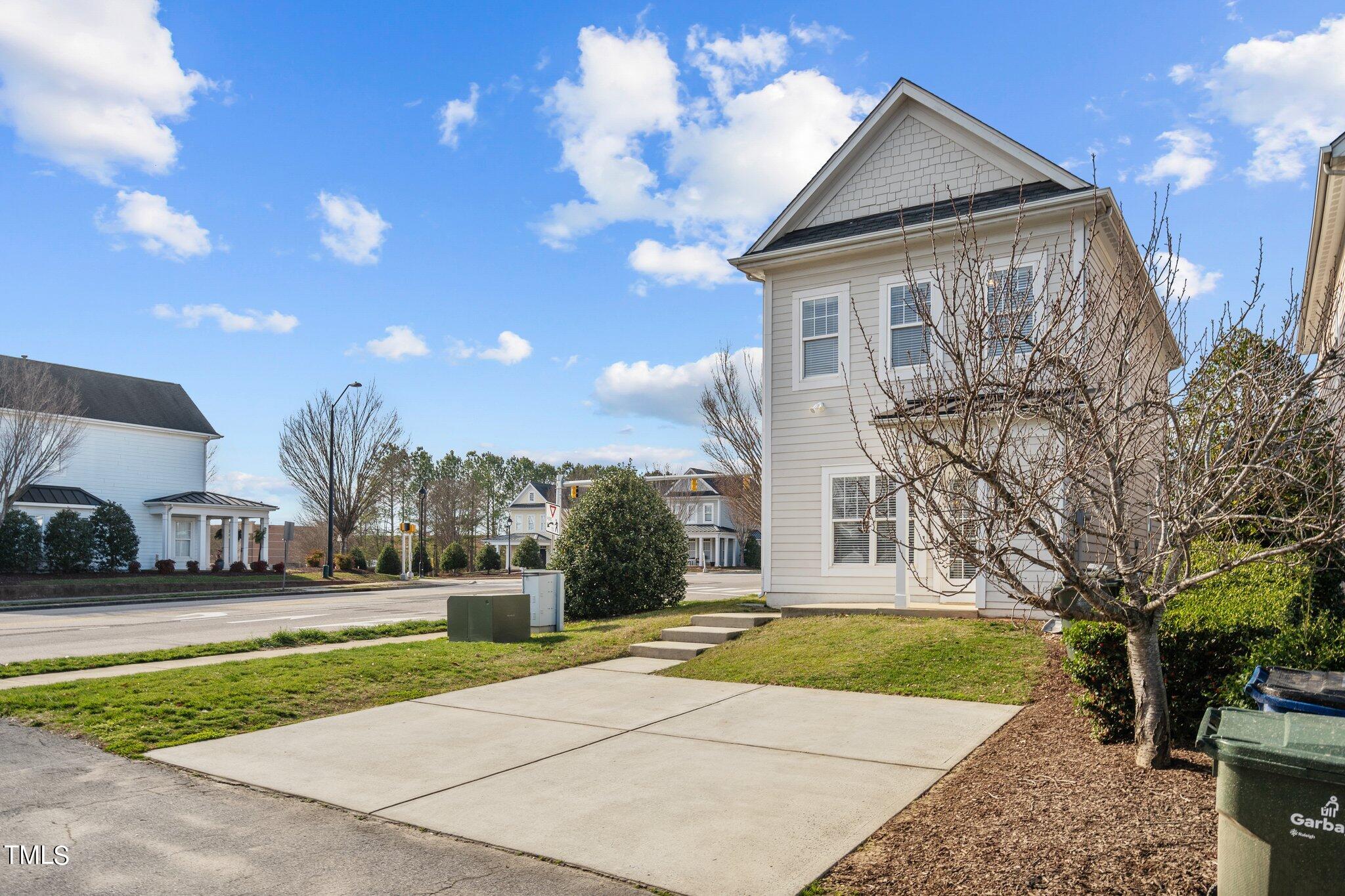 7765 Courtney Estates Drive Raleigh, NC 27617 - Photo 28 of 37 a view of a house with a yard